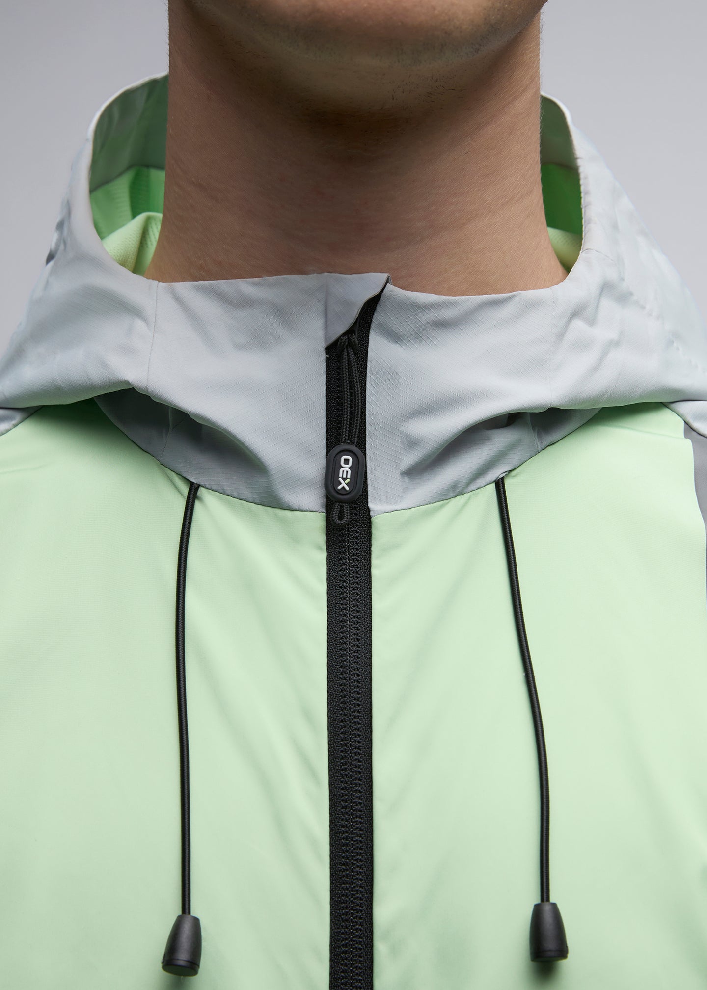 OEX Repel Windrunner-Lime-Zip Detail